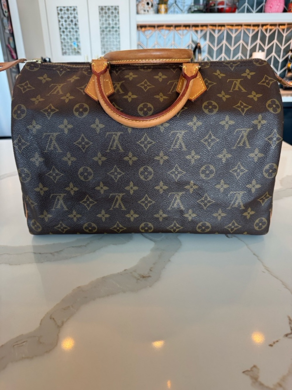 Authentic Vintage Louis Vuitton Speedy 35 Monogram Canvas Top-Handle satchel.